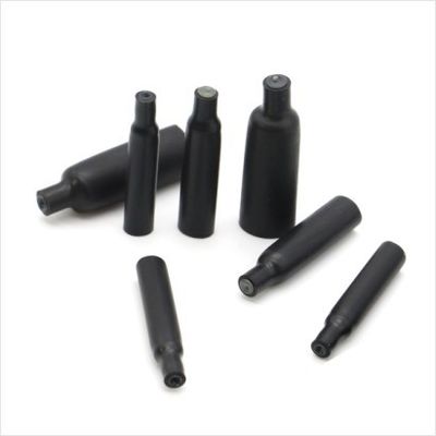 Cappucci isolanti semi-rigidi rivestiti di adesivo
